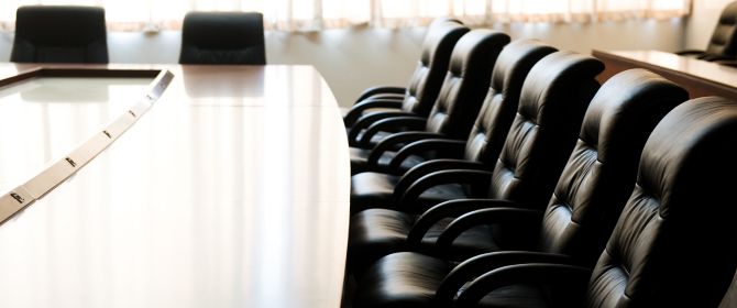 Leather chairs at boardroom table
