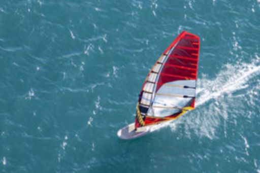 KPMG IFRS Newsletter: Financial Instruments publication image: windsurfer jumping a wave.