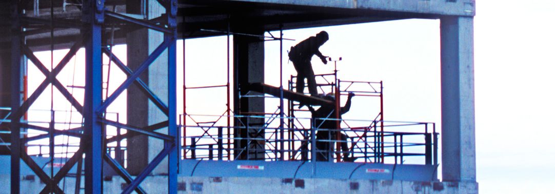 KPMG IFRS Conceptual Framework topic image: workers on a building site scaffold.