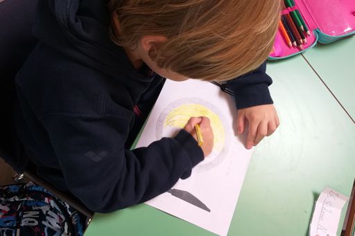a child painting a drawing