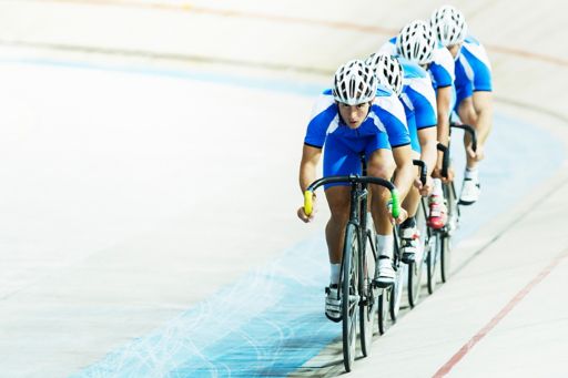 Cycling team pursuit on a track velodrome
