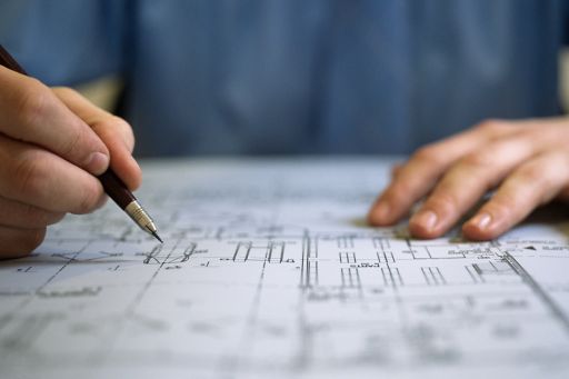 Architect drawing a plan