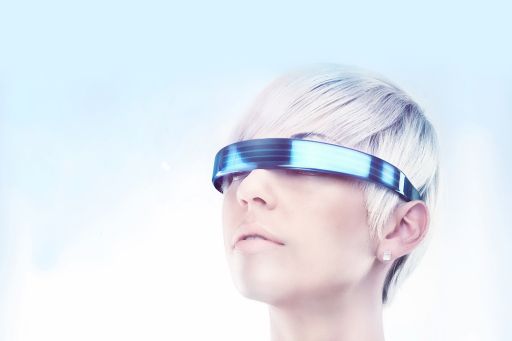 Blonde woman wearing virtual reality glasses