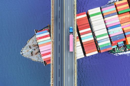 Container ship and bridge from above