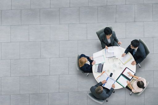 Elevated view of a business meeting at a round table