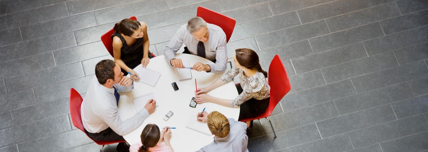 business people having a meeting around table