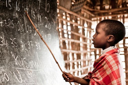 African boy in classroom,
