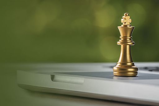 Chess piece on a laptop