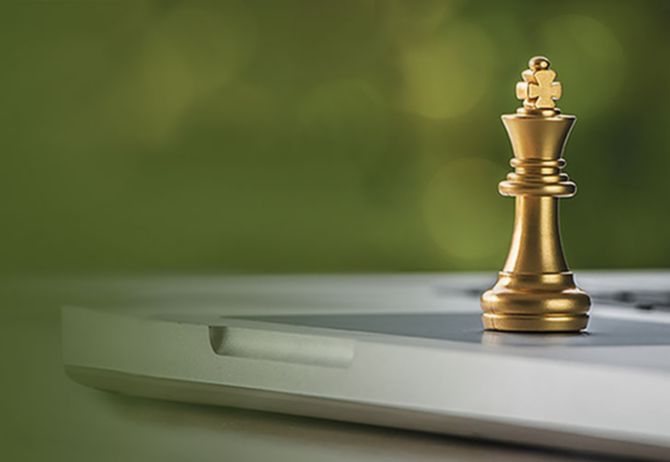 Chess piece on a laptop