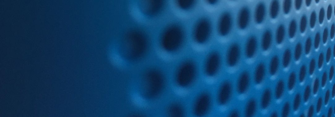 Closeup of a blue speaker