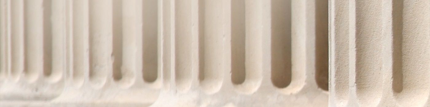 Closeup of white pillars