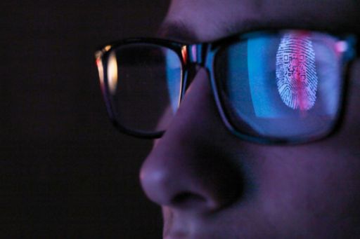 Cyber security reflection of digital fingerprint in eyeglasses