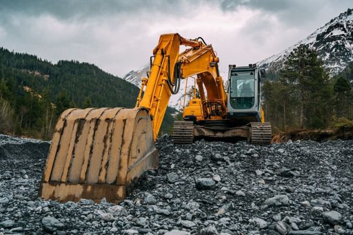 Excavator at work in mountains