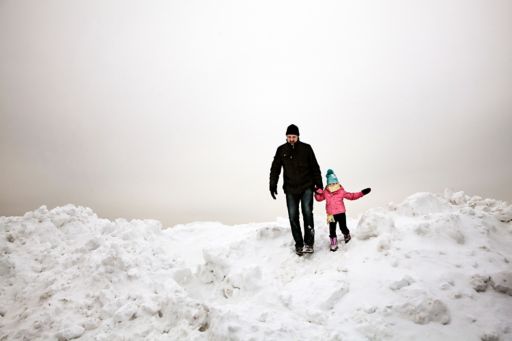 Father and child on snow