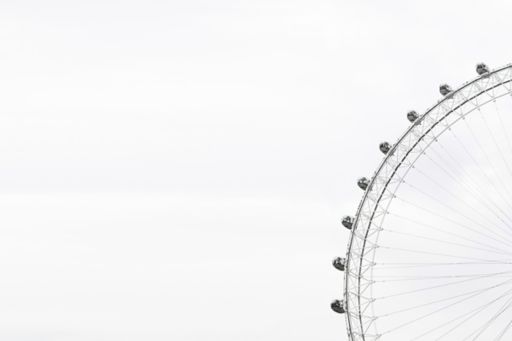 Ferris wheel against white background