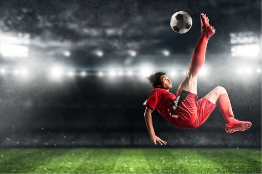 Football player attempting bicycle kick