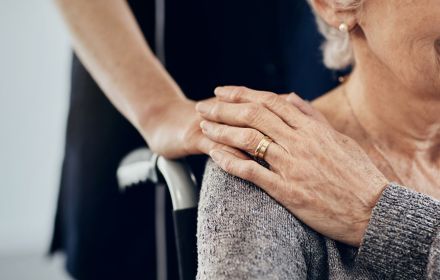 Future healthcare female caregiver comforting senior woman