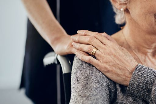 Future healthcare female caregiver comforting senior woman
