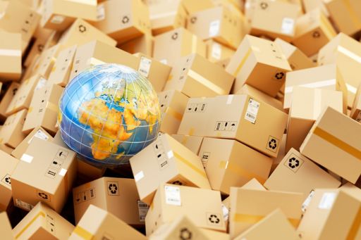 Globe sitting on shipping boxes