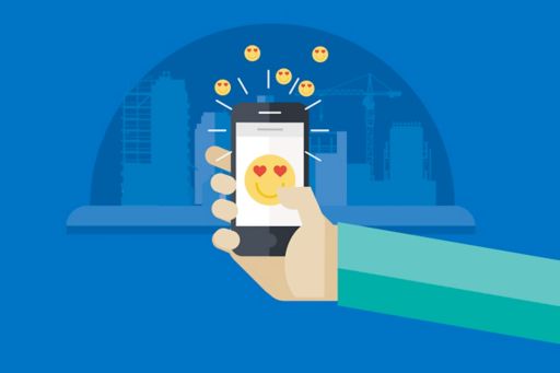 Hand holding smartphone with heart eyed emojis illustration