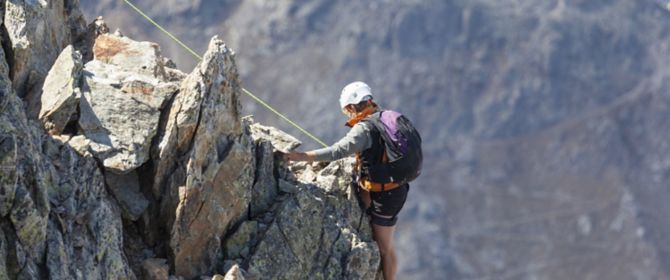 Hiker climbing a mountain