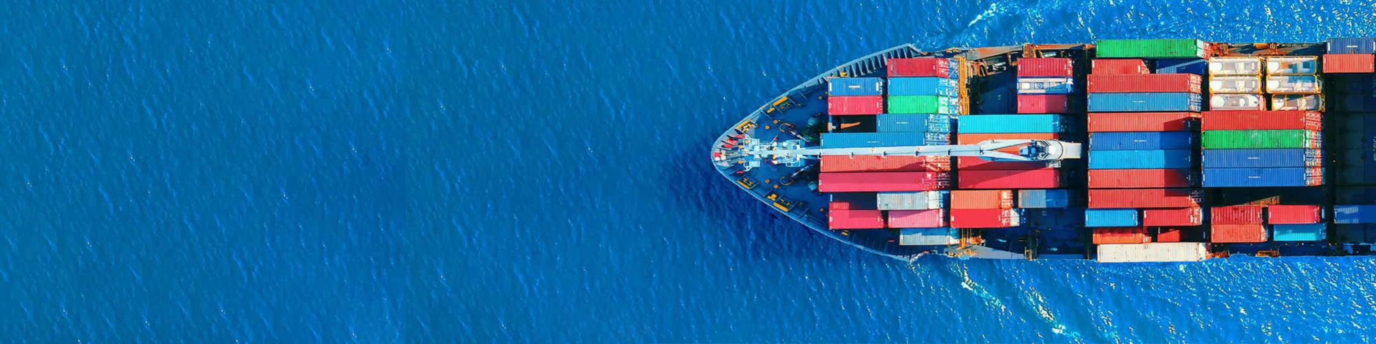 Boat carrying containers seen from above