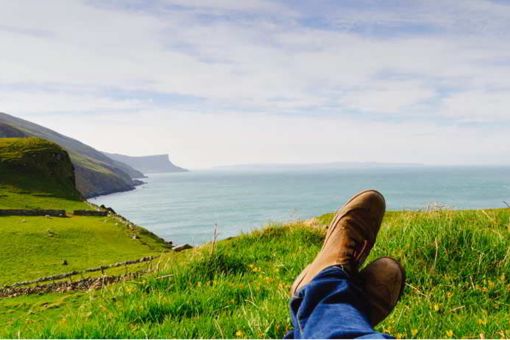Feet up overlooking the cliffs of Moher