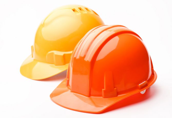 Two hard hats on white background