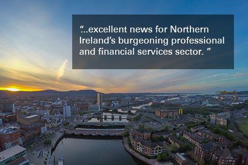 Image of Belfast city at sunset with text overlaid "excellent news for Northern Ireland’s burgeoning professional and financial services sector."