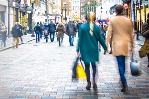 Shoppers walking on busy high street