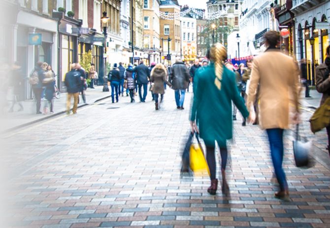 Shoppers walking on busy high street