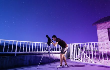 Man using Telescope