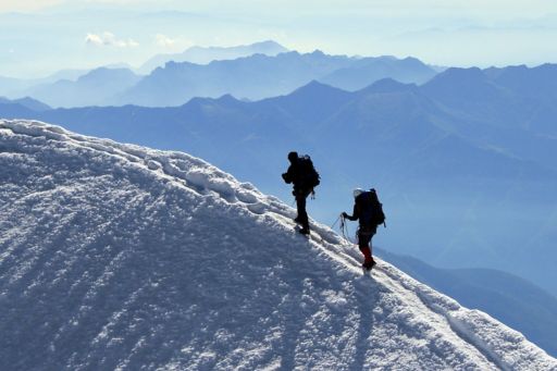 Men mountain walk snow