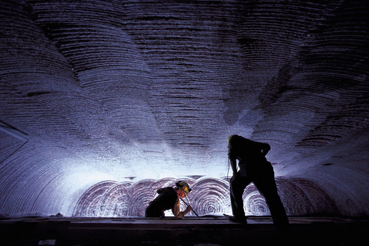 Men working in underground mine