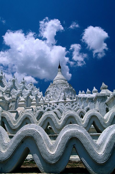White temple with clouds behind 
