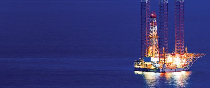 Offshore oil rig night time