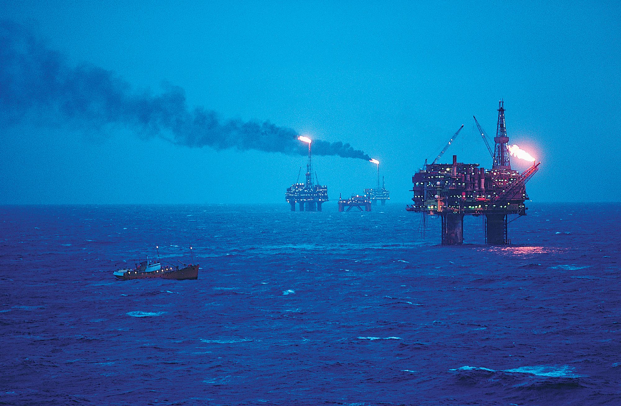 Oil refineries in middle of the blue sea