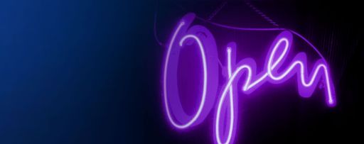 Purple neon open sign against a blue background