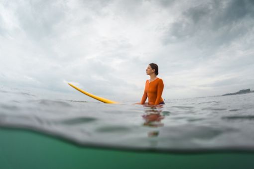 Woman on surfboard