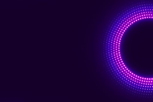 Pink lights in a circle against dark purple background