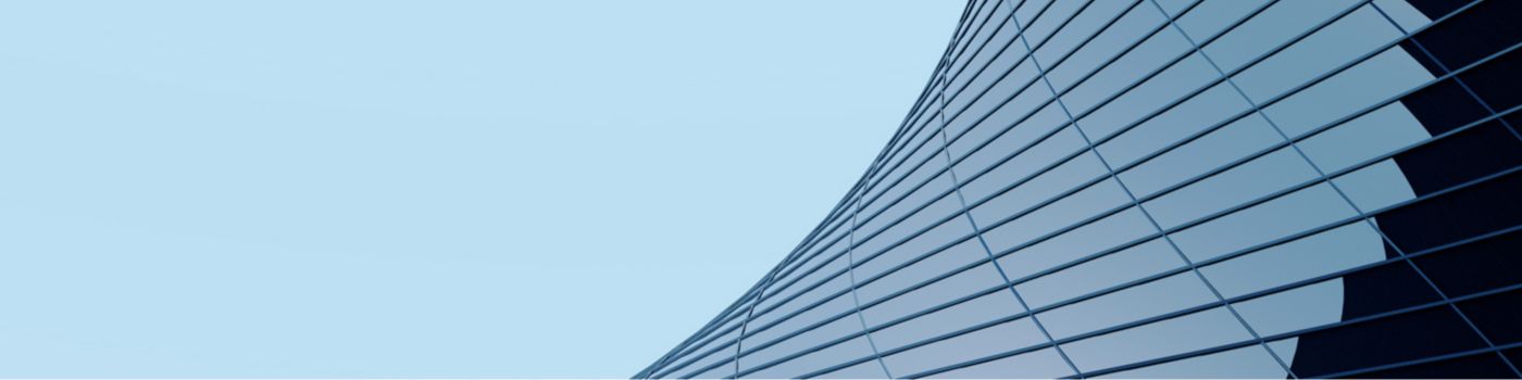 Szklana fasada budynku | Zdjęcie przewodnie artykułu "Wprowadzone prawo holdingowe źródłem kontrowersji podatkowych"