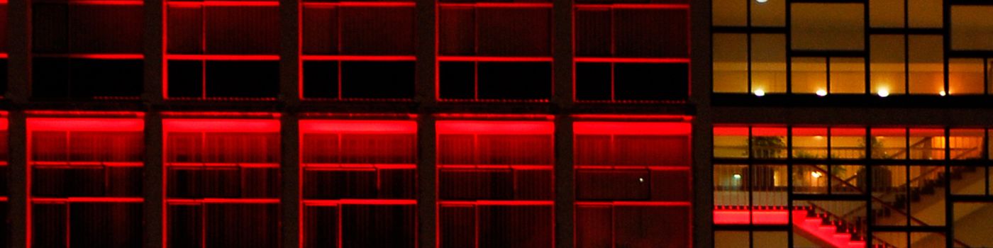Red lit glass building