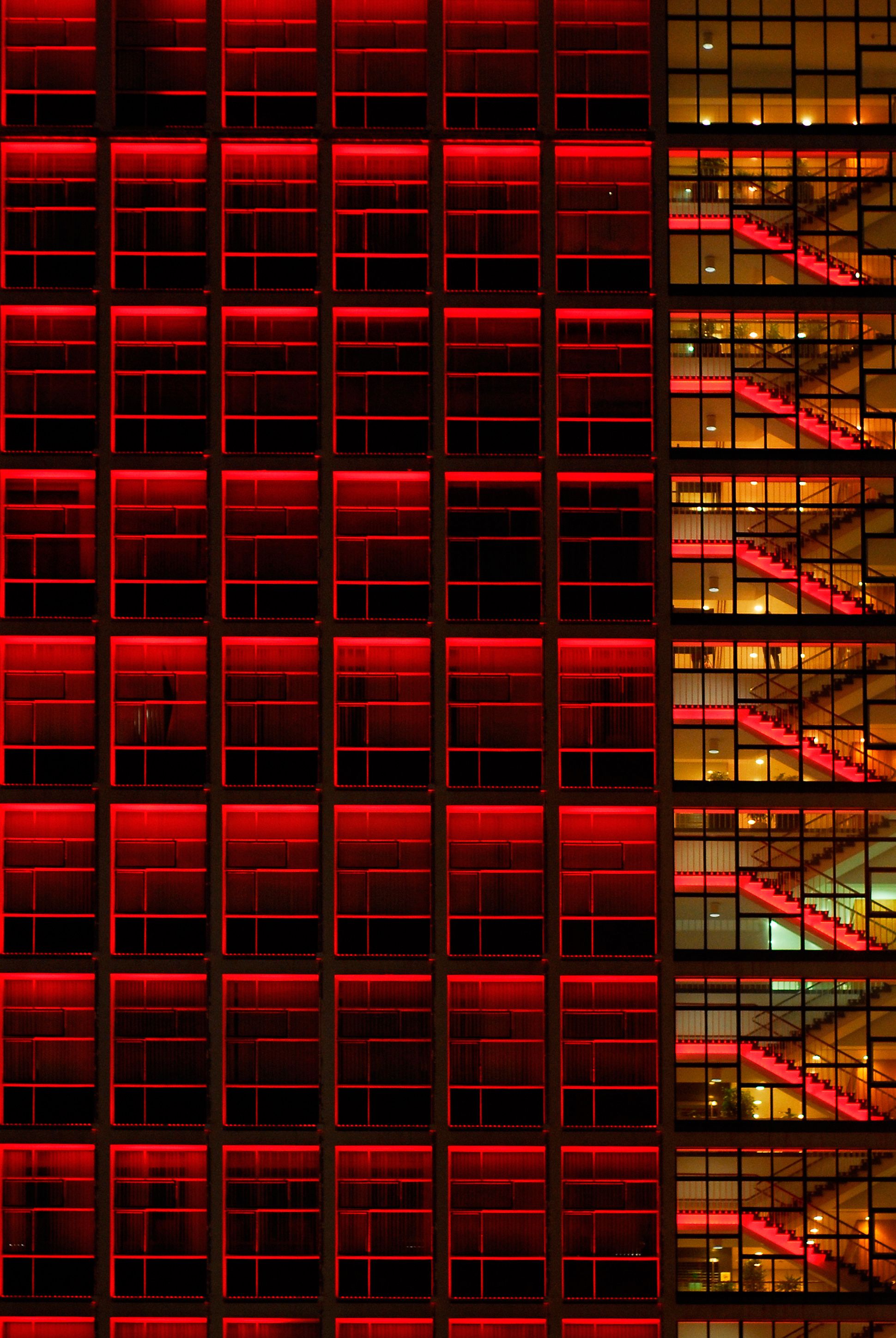 red lit glass building