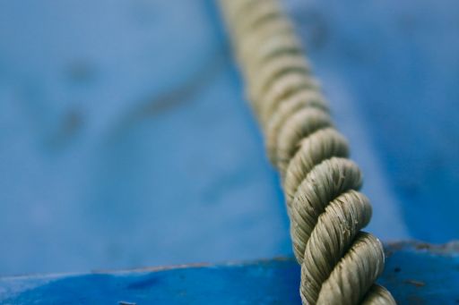 rope-on-blue-wood