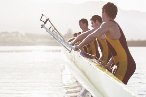 rowers lifting boat