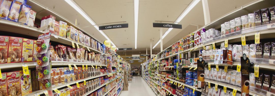 An aisle of a grocery store, diminishing perspective