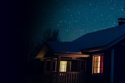 shot of a house on starry night