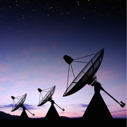 Space satellite signal receiving antennas at night