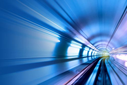 Look Back Face Forward: 2020 Real Estate trends - subway-tunnel-with-blue-and-white-lights-on-both-sides