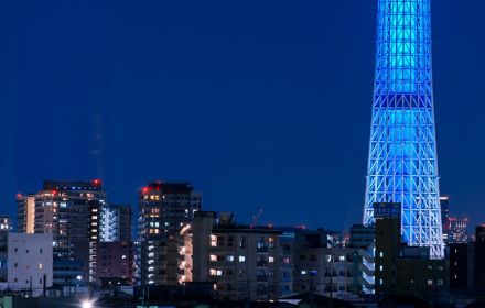 Tokyo blue glass building at night
